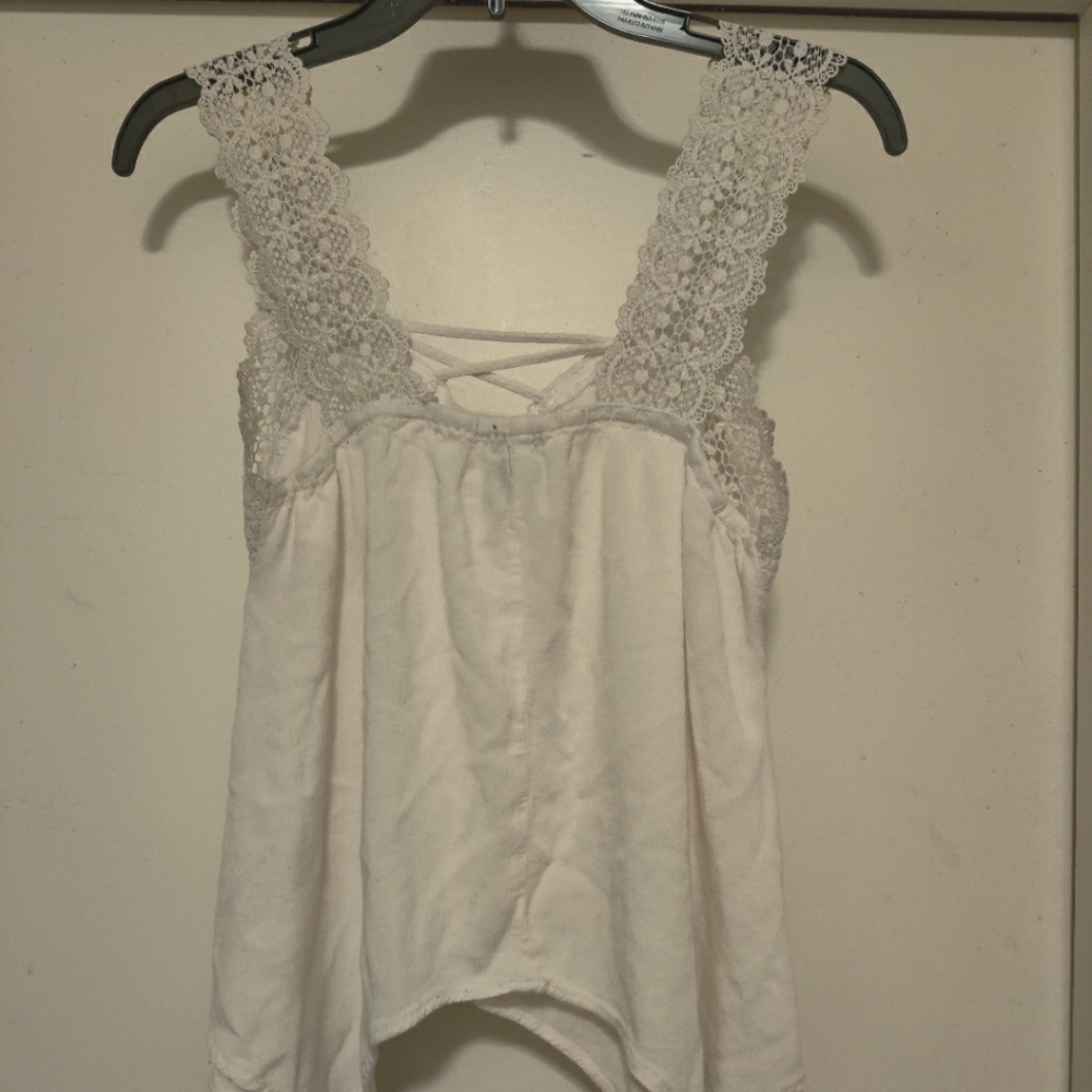Medium Size Cream Sleeveless Blouse